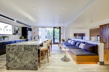 Large community lounge with plenty of seating areas and countertop spaces - Photo Gallery 5