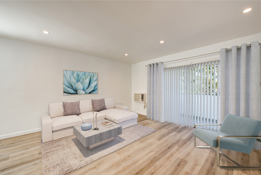Spacious living area with sliding glass door