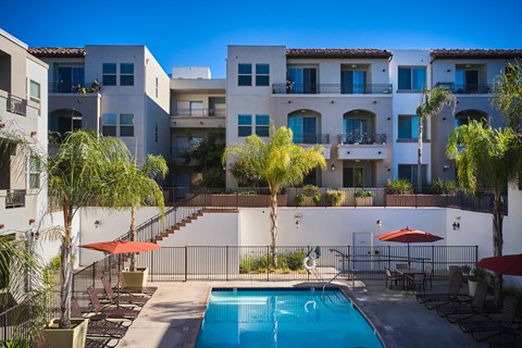 Outdoor pool with lounge chairs