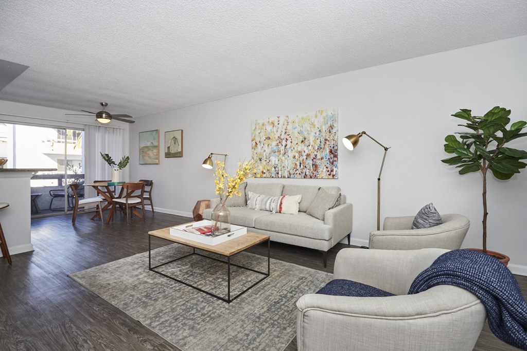 Living Area and Dining Area Looking Out Onto Balcony