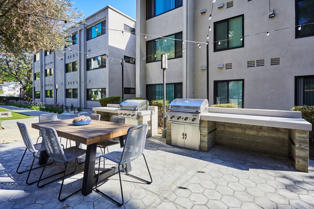 Outdoor lounge with two BBQs