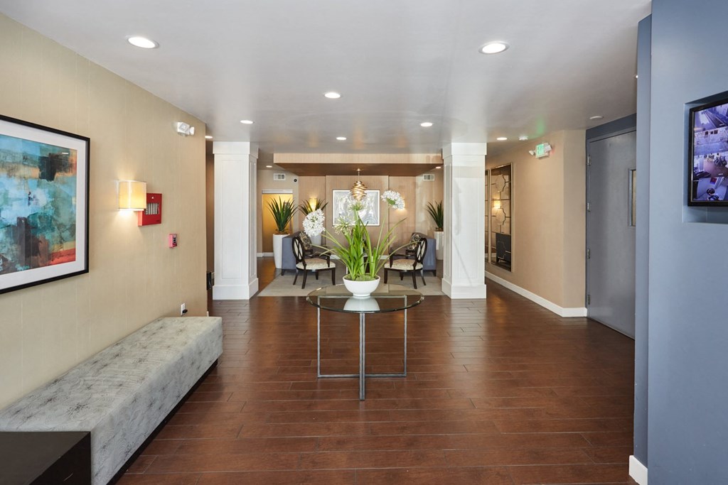 Spacious lobby with wooden flooring and ample seating