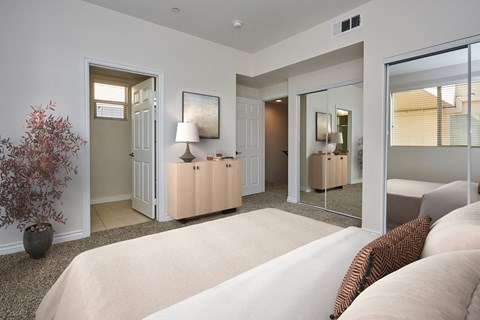 Bedroom with queen bed and attached bathroom