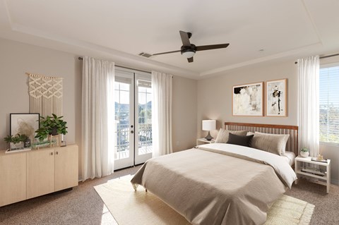 Spacious bedroom with full bed and attached outdoor patio