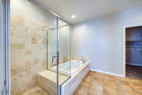 Bathroom with bath tub and shower
