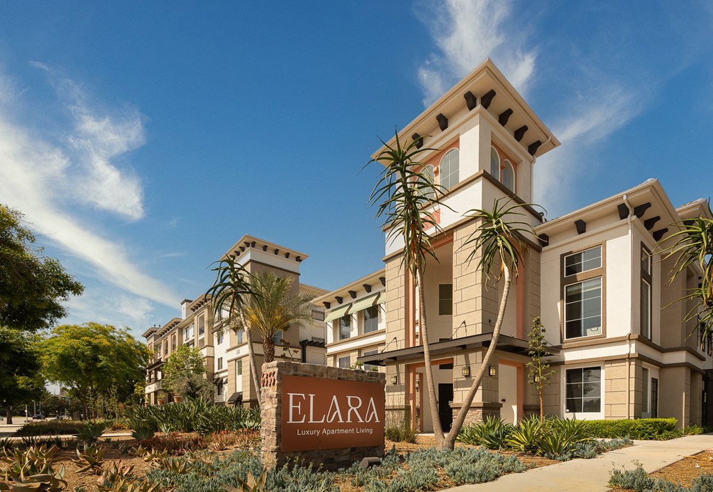 a sign in front of a building