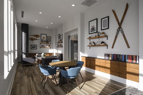 a rendering of a dining room with a table and chairs