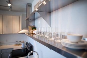 glasses and plates on shelf - Photo Gallery 14