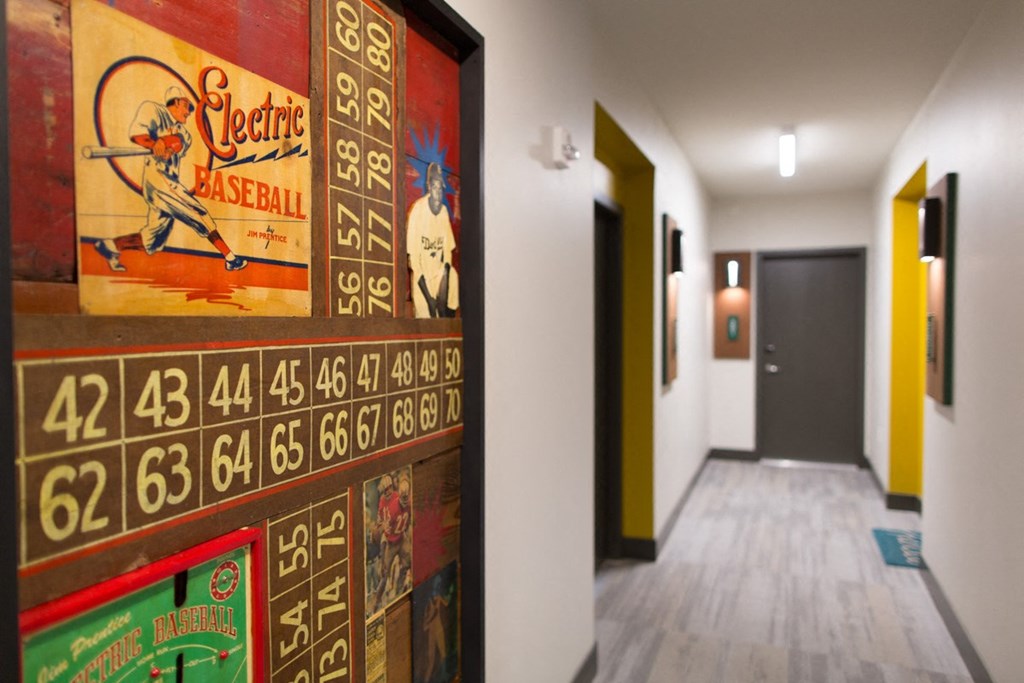 hallway with wall art at Pinnex, Indianapolis