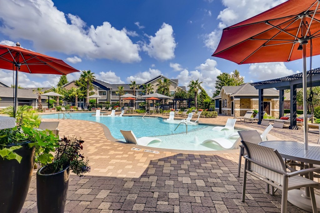 Pool seating and sun deck at Avenues at Shadow Creek Ranch, Pearland, TX, 77584