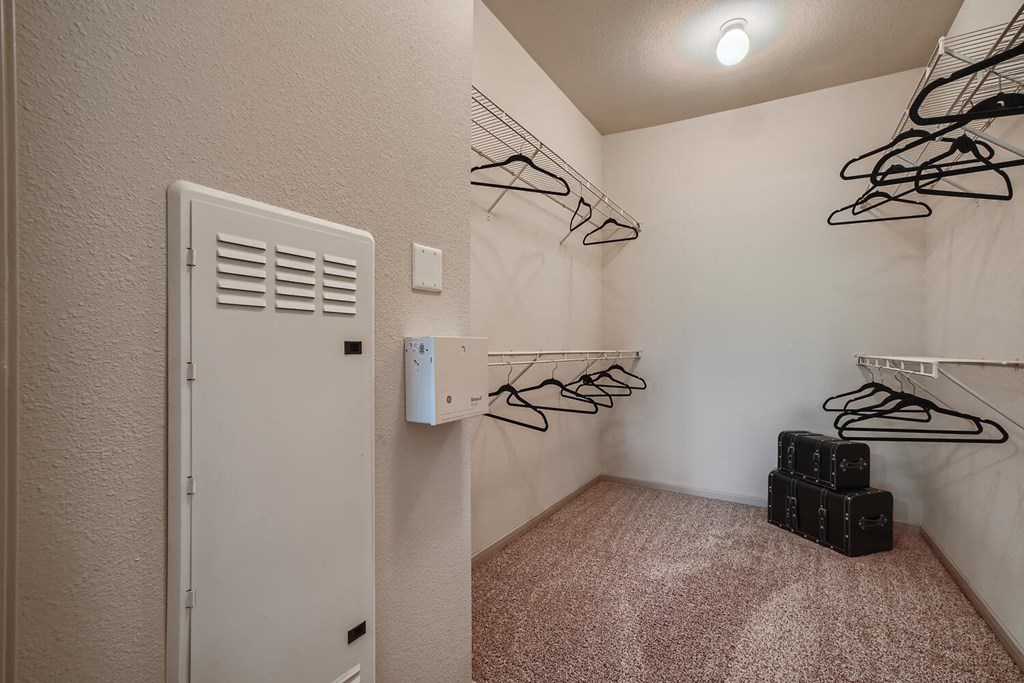 walk in closet in the master bedroom  at Grand Villas Apartments, Katy