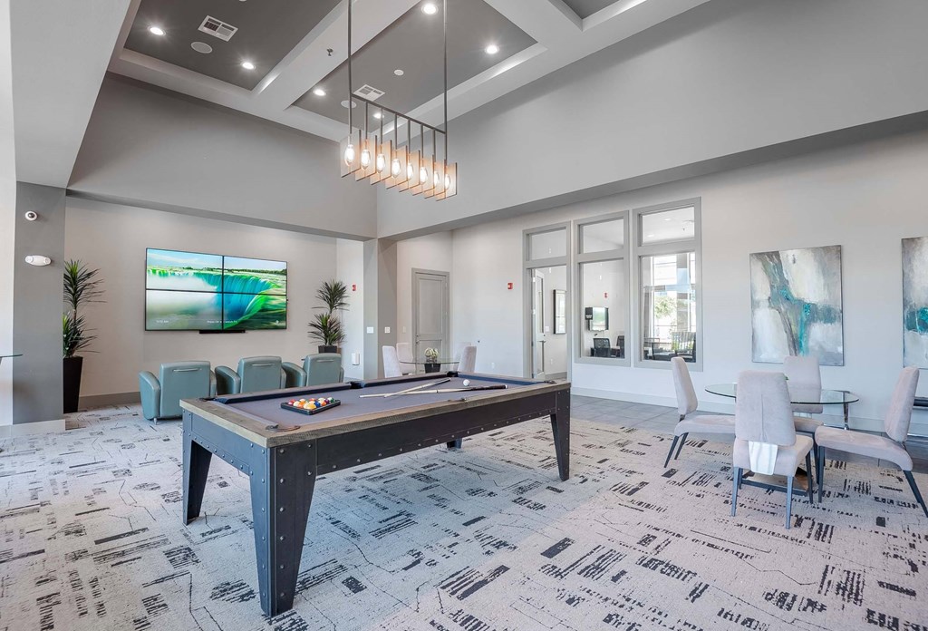 a game room with a ping pong table at Discovery at Craig Ranch, McKinney, 75070