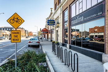 bike sign in front of neighborhood store - Photo Gallery 50
