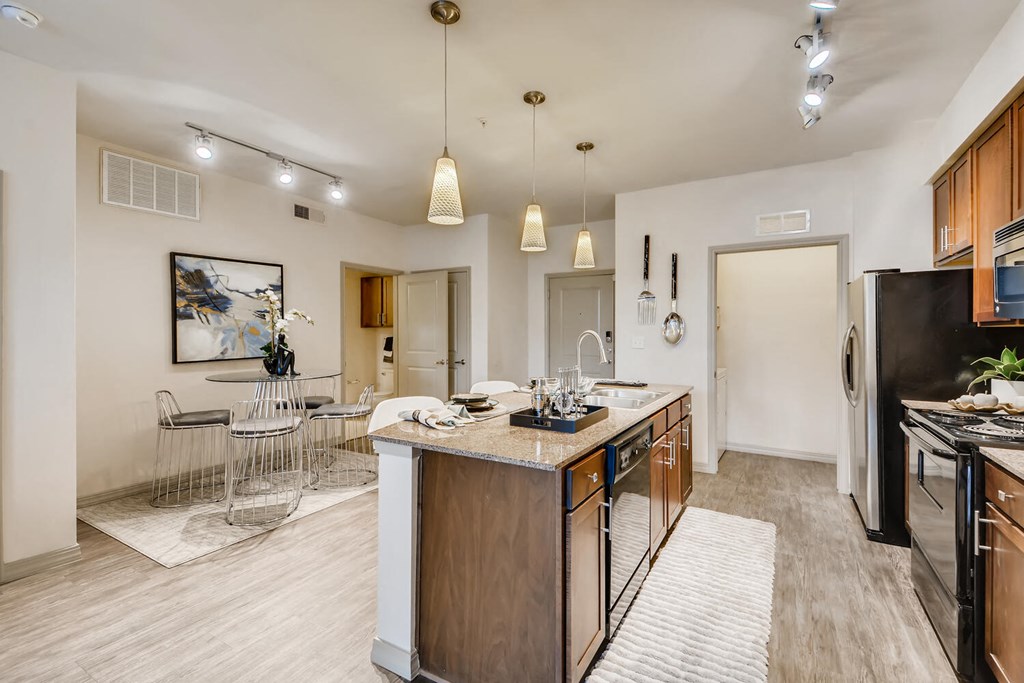 Kitchen And Living at Discovery at Craig Ranch, Texas, 75070