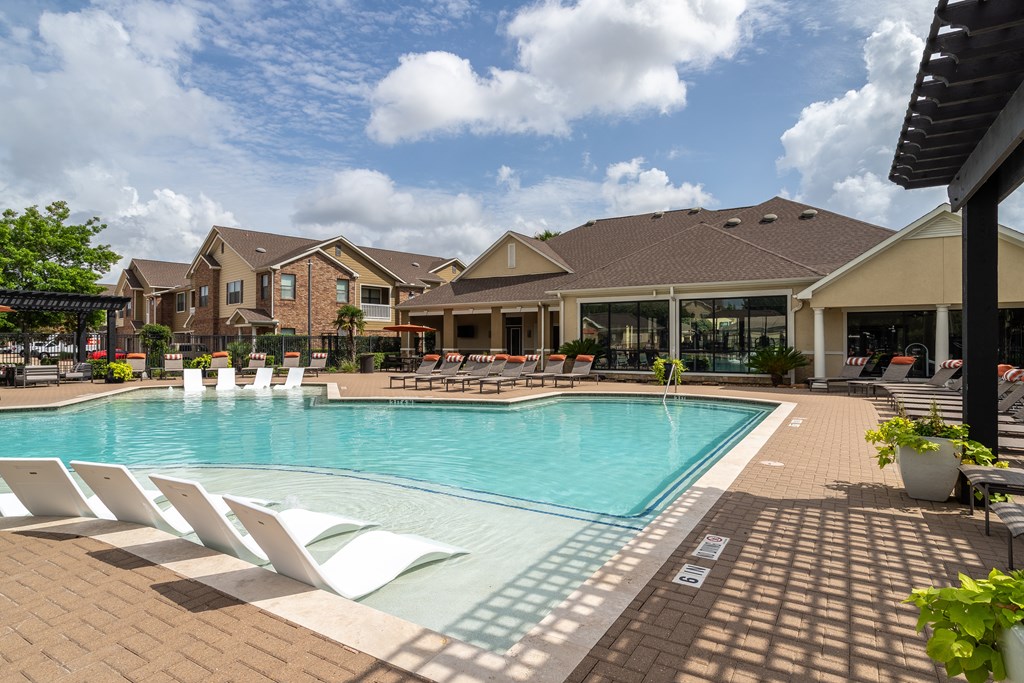 Swimming pool with lounge chair at Grand Villas at Cinco Ranch, Katy, 77494