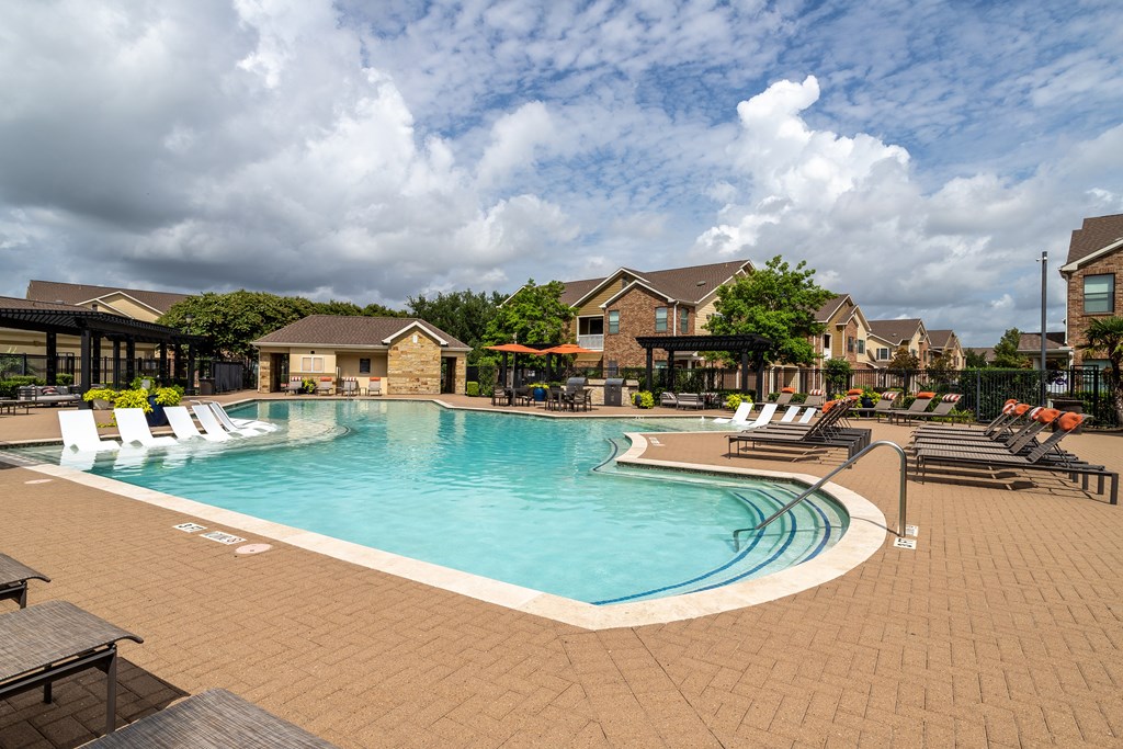 Large outdoor swimming pool at Grand Villas at Cinco Ranch, Katy, Texas