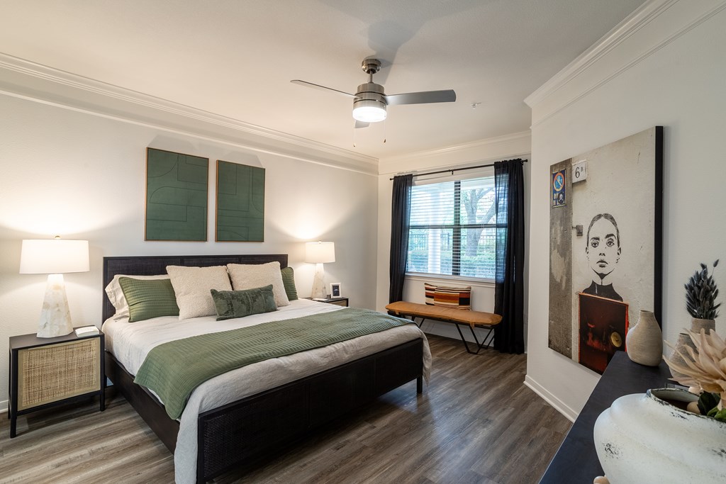 Bedroom with a lamp at Grand Villas at Cinco Ranch, Katy