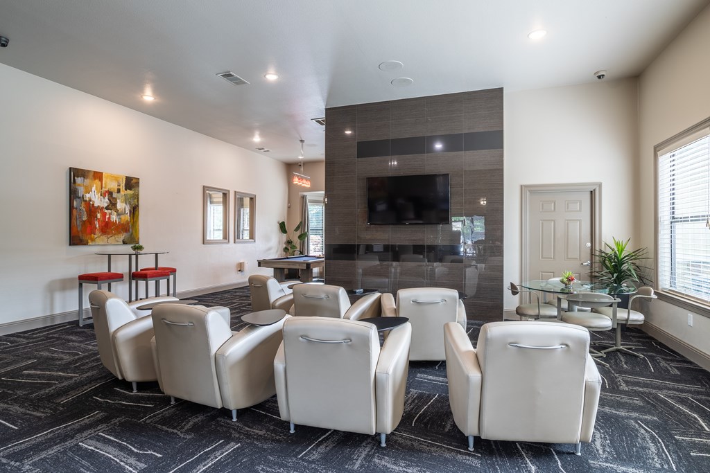 Clubhouse with white chairs at Grand Villas at Cinco Ranch, Texas, 77494