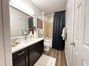 Bathroom with mirror at Grand Villas at Cinco Ranch, Katy, 77494