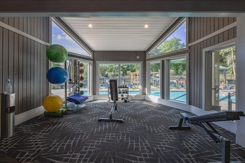 a gym with windows and a view of a pool  at Butternut Ridge, Ohio