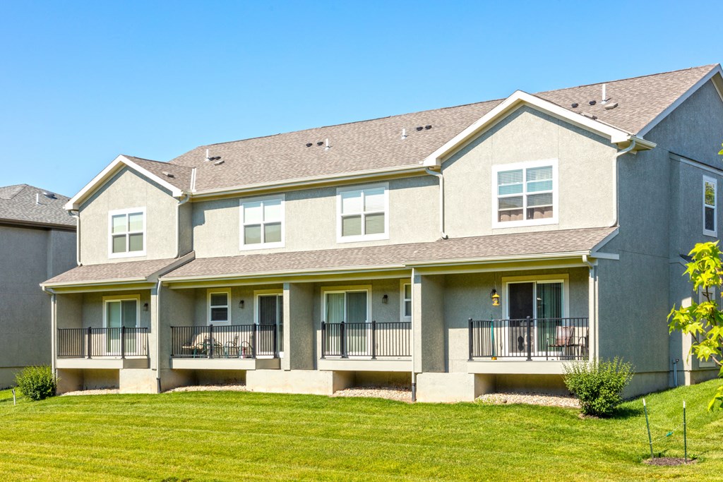 view of back exterior of townhomes at Prairie Pines Townhomes, Shawnee