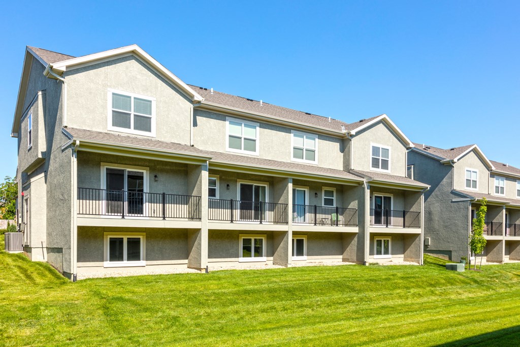 view of back exterior of townhomes at Prairie Pines Townhomes, Shawnee, 66226