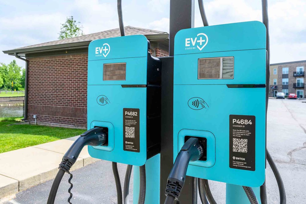 Two electric vehicle charging stations are shown in the image.