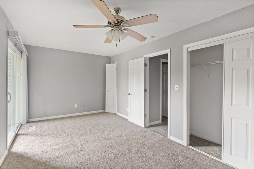 Carpeted Bedroom at Spring Creek Townhomes Apartments, Springfield, Illinois