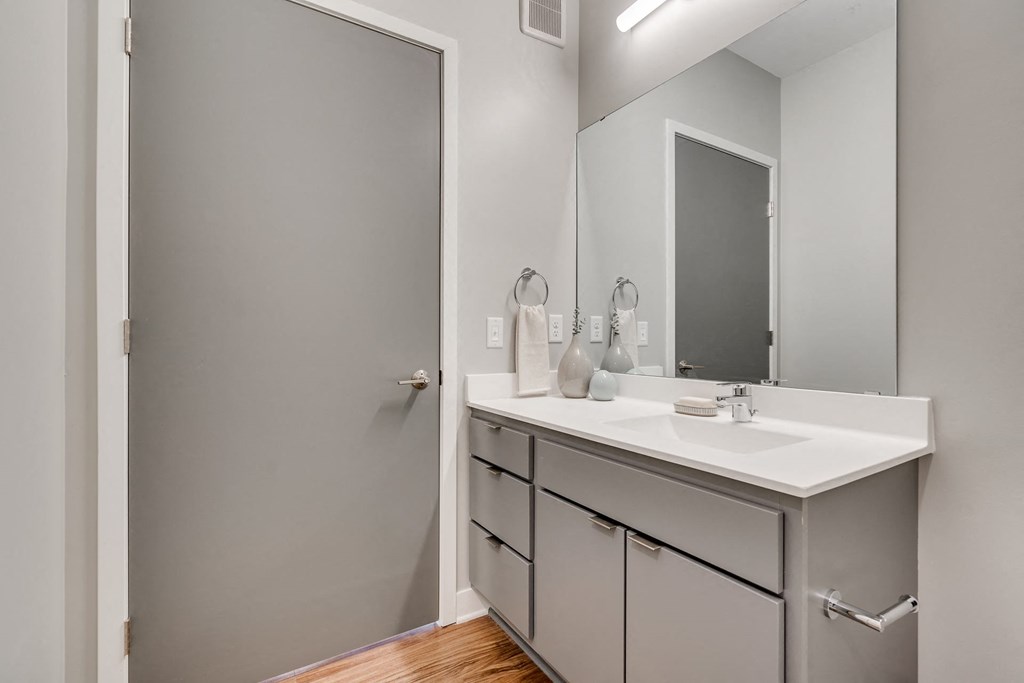 a bathroom with a sink and a mirror at Marquee, Minneapolis, MN