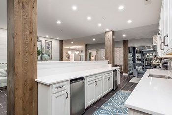 cabinets and sink inside of clubhouse - Photo Gallery 26