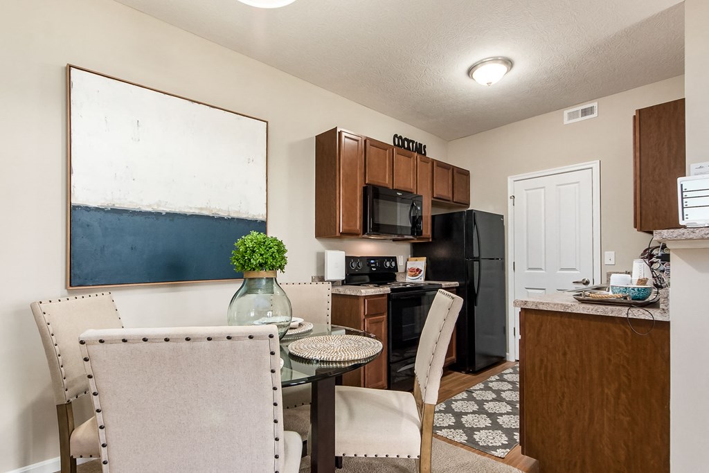 dining area next to kitchen in apartment at The Greyson, Ohio, 43026