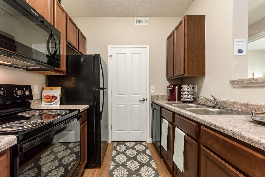 black appliance in kitchen in apartment at The Greyson, Hilliard, OH