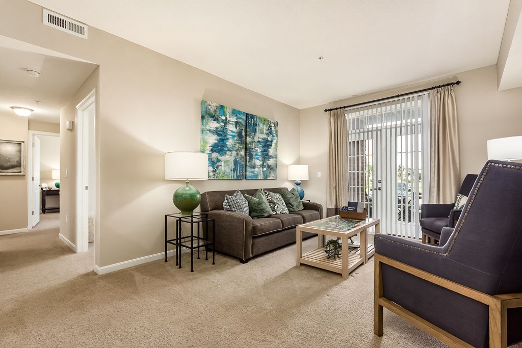 living room with view of patio at The Greyson, Hilliard, OH, 43026
