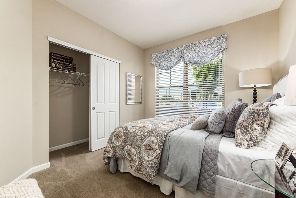 bedroom with view of closet in apartment at The Greyson, Ohio