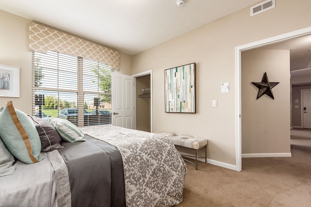 bedroom with view of window at The Greyson, Ohio