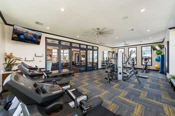 exercise machines in fitness center - Photo Gallery 23