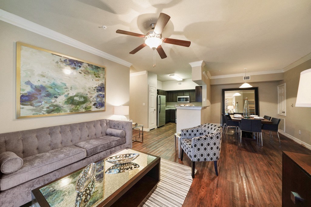 living room with ceiling fans at River Pointe, Conroe, Texas