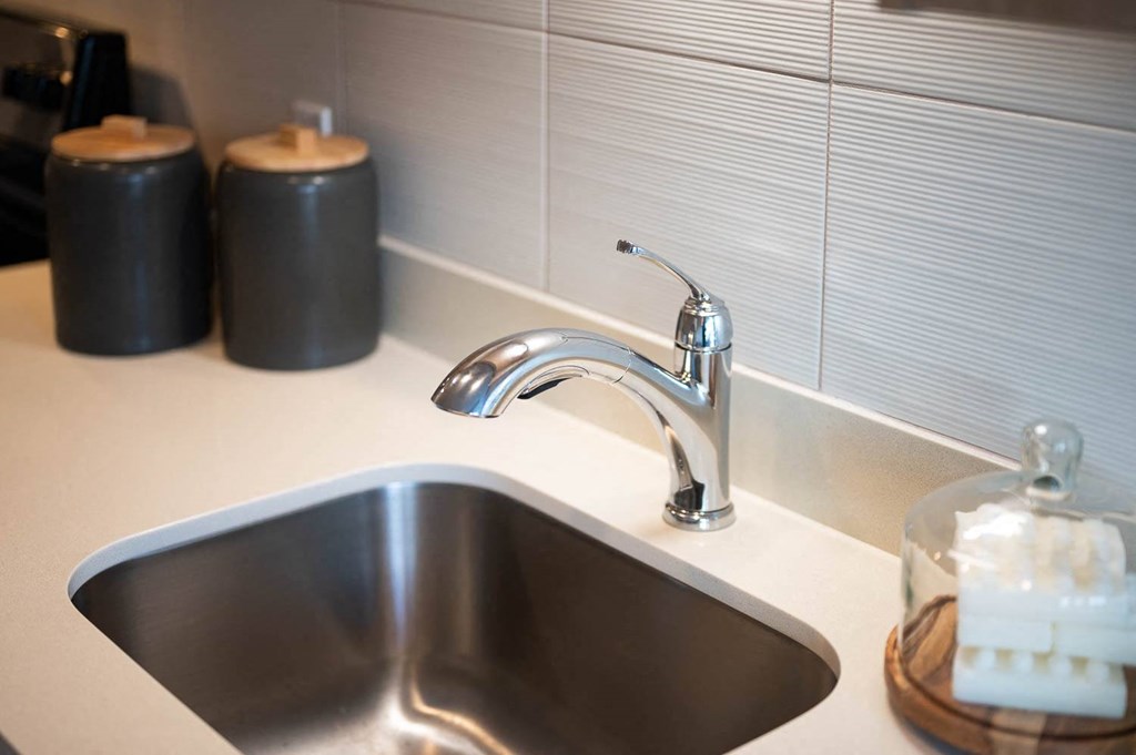 The Byway | Model #105 Solid Surface Countertops and Modern Backsplash Tile