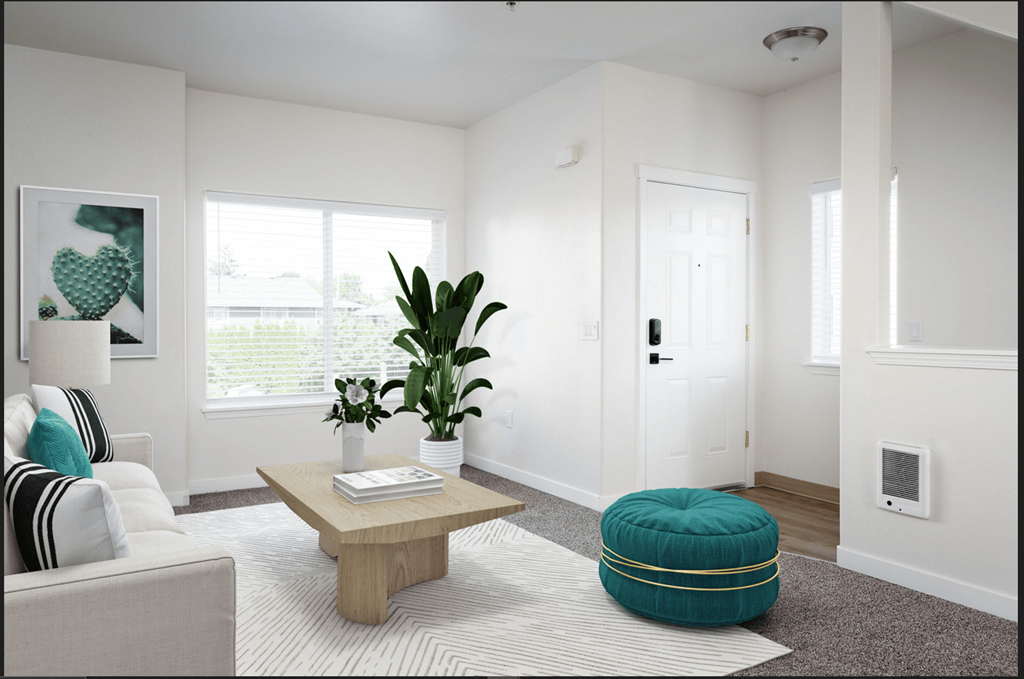 a living room with white walls and a green ottoman