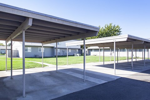 a parking lot with a building in the background