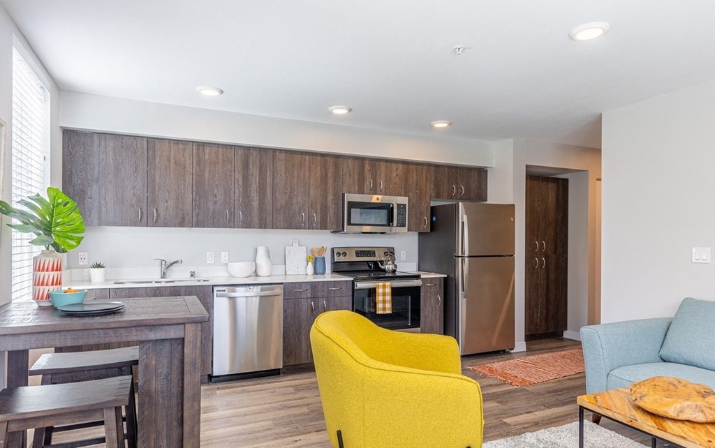 134th street lofts kitchen with stainless steel appliances
