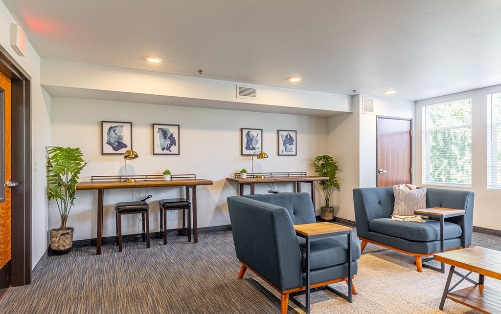 134th street lofts work and study room with desks and seating