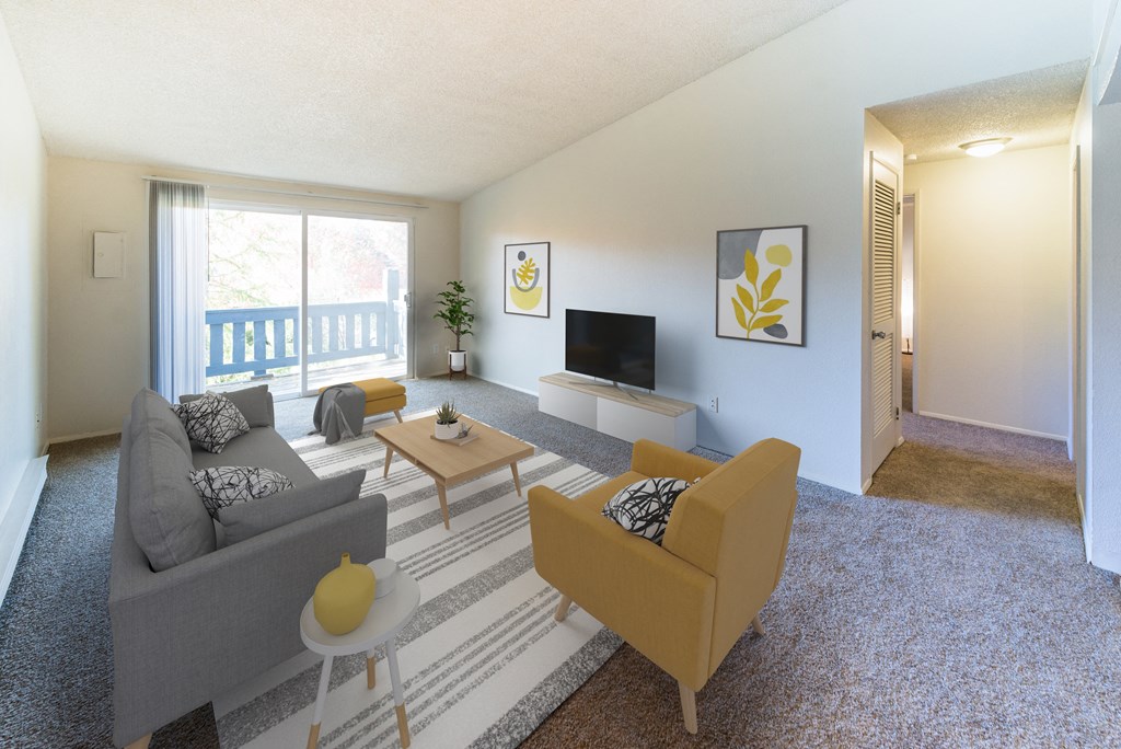 a living room with couches and a table and a television