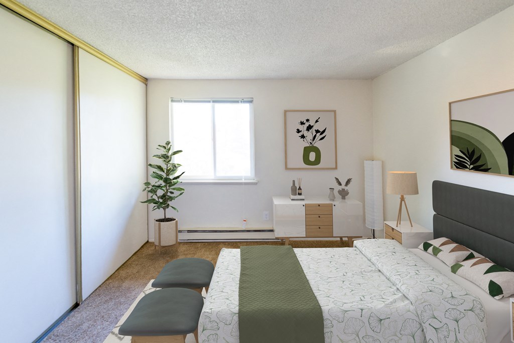 a bedroom with a bed and a dresser and a window