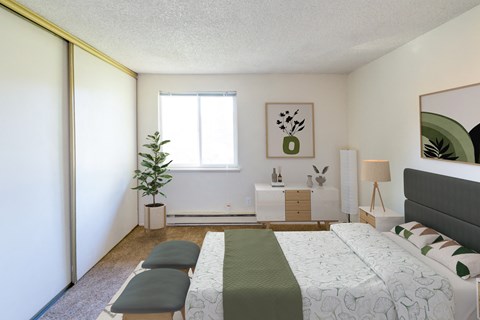 a bedroom with a bed and a dresser and a window