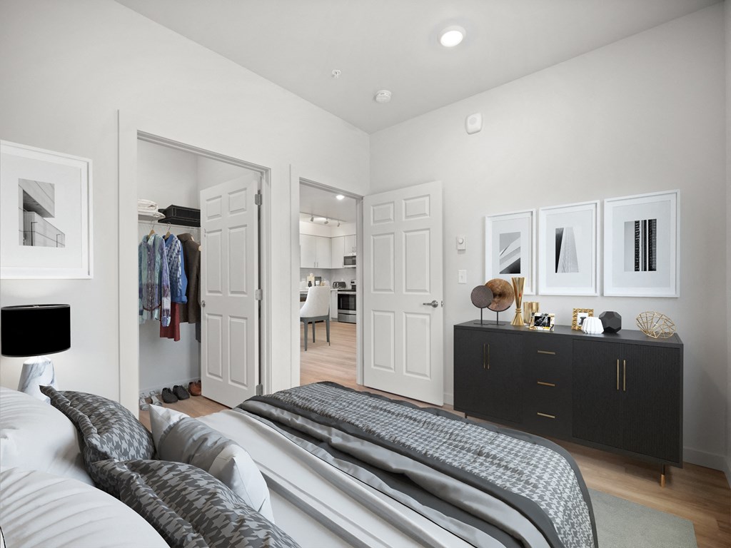 a bedroom with a bed and a closet