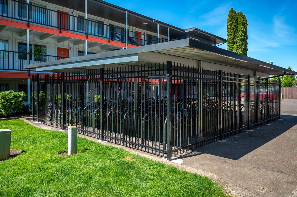 a pavilion with bikes parked outside of a building