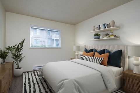 A bedroom with a large bed and a window.