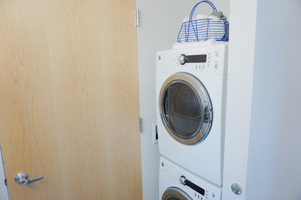 a washing machine and dryer in a laundry room