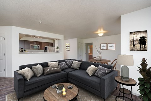 a living room with a large couch and a table